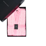 Pink robe with geometric pattern in a black box, featuring Philipp Plein branding.