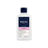 Front studio shot of Phyto Boucles Intenses Curl Defining Shampoo 250ml, available at Blue Salon Online. The clear cylindrical bottle shows its rich fluid formula, featuring a clean white label with soft peach accents under a metallic silver cap.