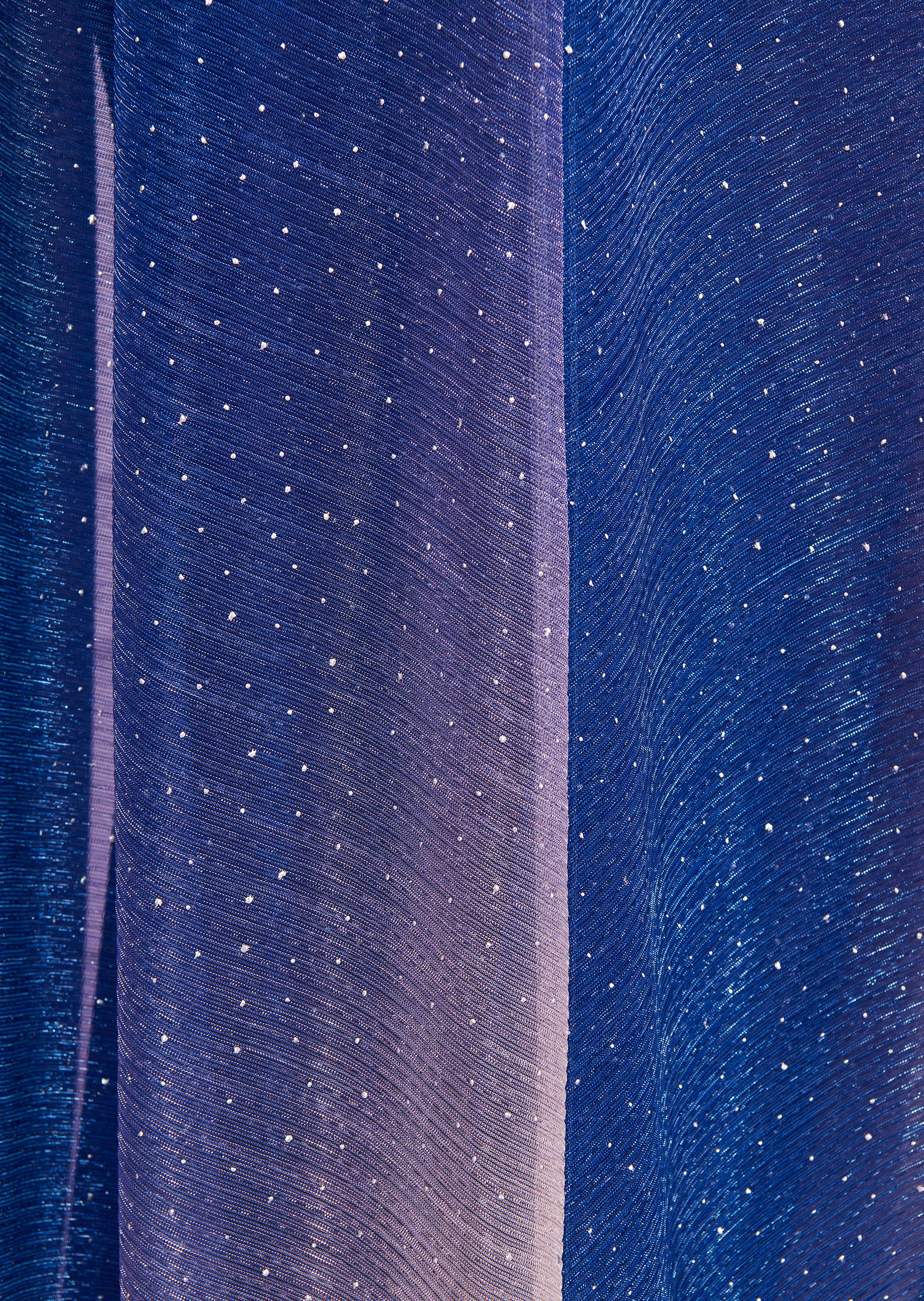 Cornflower blue long dress with a sheer, flowing texture, adorned with scattered white glitter dots.