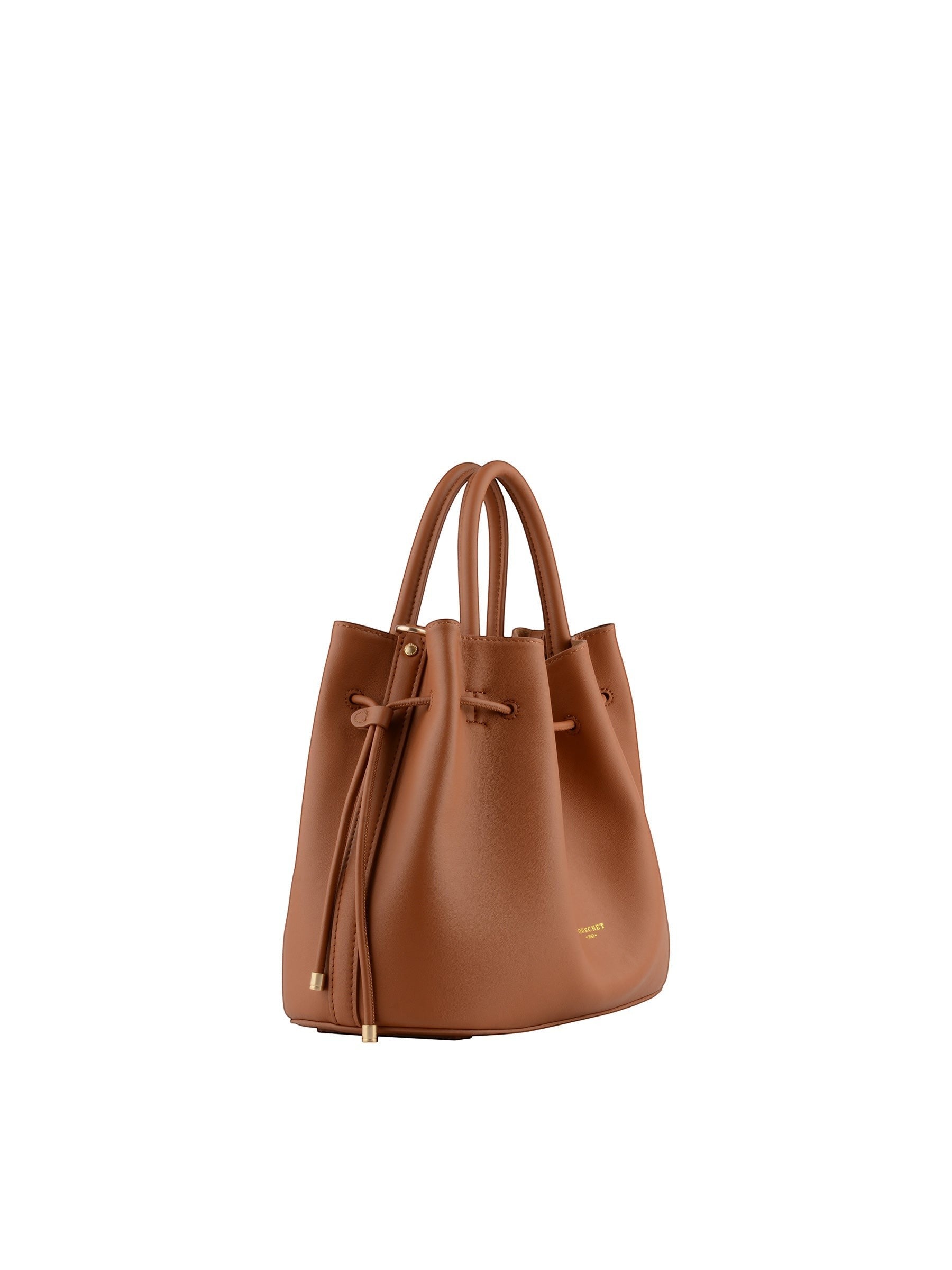A three-quarter view of the camel pebbled leather Pourchet bag, highlighting the top handles and gold-tipped drawstring closure.