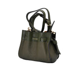 Side view of the Pourchet Blossom bag  pebbled leather, featuring a decorative knotted leather tie and a gold-toned D-ring attachment.