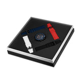 Overhead view of the deluxe Police presentation gift box containing the watch head nestled alongside four individual quick-change silicone straps in red, white, black, and blue.