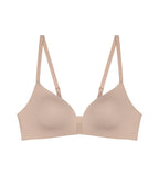 Product-only view of the Triumph Fit Smart beige non-wired bra, highlighting the stretchable lace design and wireless comfort construction. Available Online Now