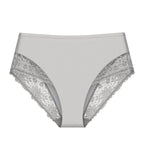 Product-only view of the Triumph Ladyform Soft light grey maxi panty, highlighting the high-waisted fit and delicate lace side inserts. Find Now Online