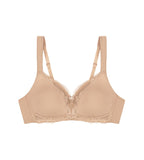 Product-only view of the Triumph Modern Lace+Cotton beige non-wired bra, showcasing the cotton cups and decorative floral lace. Shop the Latest Online
