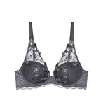 Product-only view of the Triumph Sensual Spotlight grey wired padded bra, highlighting the delicate lace cups and supportive structure. Shop Online at Blue Salon Qatar