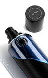 M.INT Quantum Eau de Parfum 75ml bottle with sleek black box and blue wave detailing, presenting a bold and contemporary fragrance design, Order Online Today.