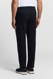 Dark blue jersey cargo trousers with an elasticated drawstring waist, two back welt pockets, and a left thigh cargo pocket.