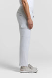 Light grey jersey cargo trousers with an elasticated drawstring waist, a back slit pocket, and a flap cargo pocket on the lef