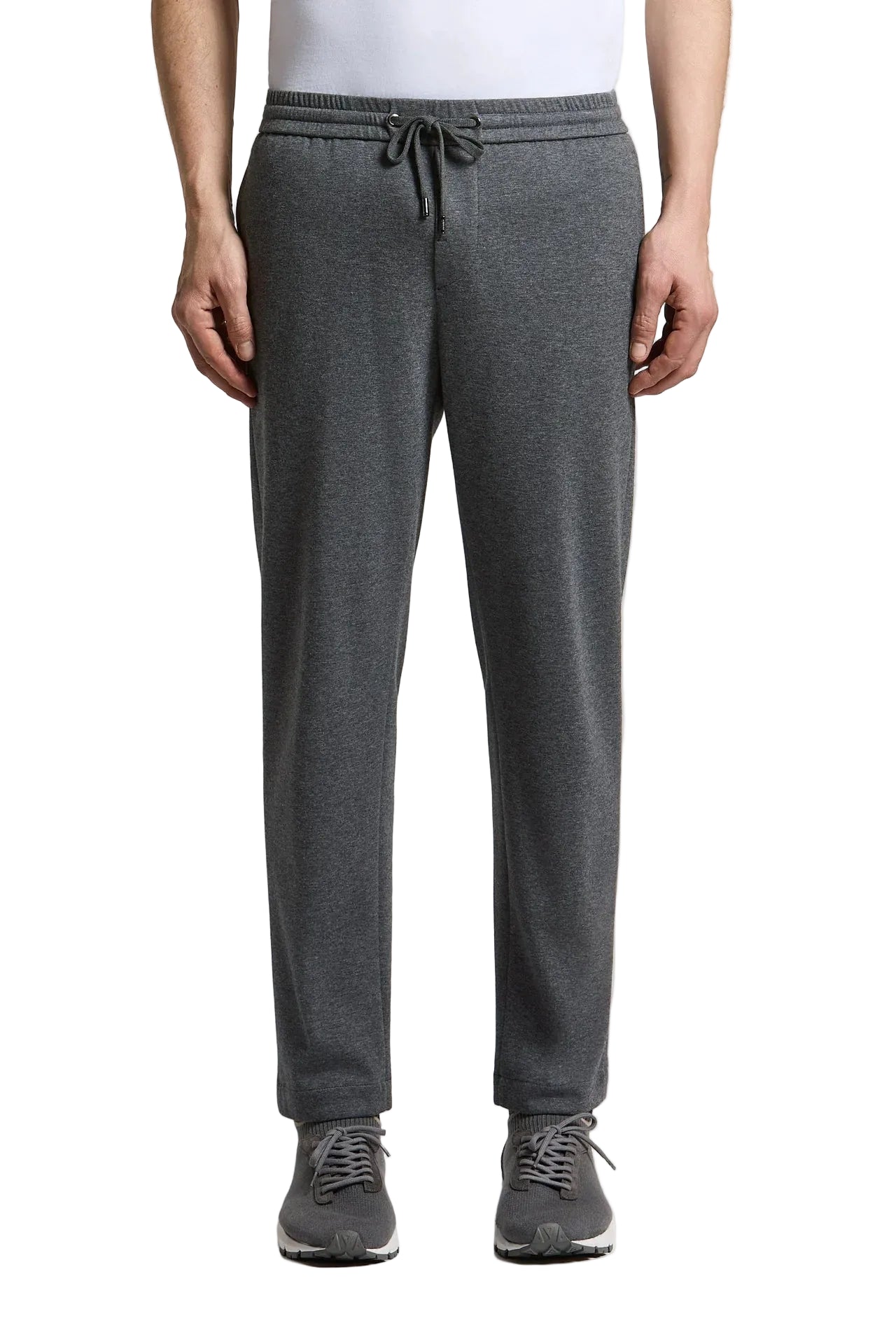 Dark grey relaxed-fit knit trousers with an elasticated waistband, drawstring, and elasticated cuffs.