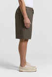 Brown linen canvas jogger Bermuda shorts with an elasticated drawstring waist and a zippered pocket on the left hip.