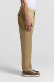 Beige pure cotton gabardine chino trousers with a cuffed hem and a buttoned flap pocket on the right side.