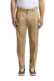 Beige pleated cotton gabardine chino trousers with belt loops, a button and zip fly, and slash side pockets.