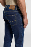 Dark blue slim fit cotton twill jeans with a brown PESERICO patch, gold-toned stitching, and a silver-toned tag.