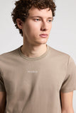 Pure cotton taupe short-sleeved crewneck T-shirt with 'PESERICO' text on the chest.