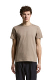 Taupe pure cotton crewneck T-shirt with short sleeves and a small white 'PESERICO' logo on the chest.
