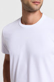 White pure cotton crewneck T-shirt with short sleeves and a subtle, tone-on-tone "PESERICO" logo on the chest.