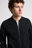 Dark blue cotton jersey bomber-style sweatshirt with a band collar, full silver-toned zip front, and two front patch pockets.
