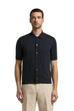 Navy blue ribbed knit short-sleeve shirt with a classic collar and full button front closure.