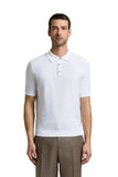 White pure cotton short-sleeved polo shirt with a subtle diamond knit pattern and three-button placket.