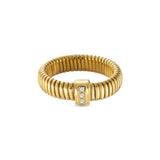 Gold-toned tubogas ring with a rectangular top featuring three vertically set clear stones.