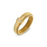 Gold-toned tubogas ring with a rectangular motif set with three clear brilliant-cut stones.