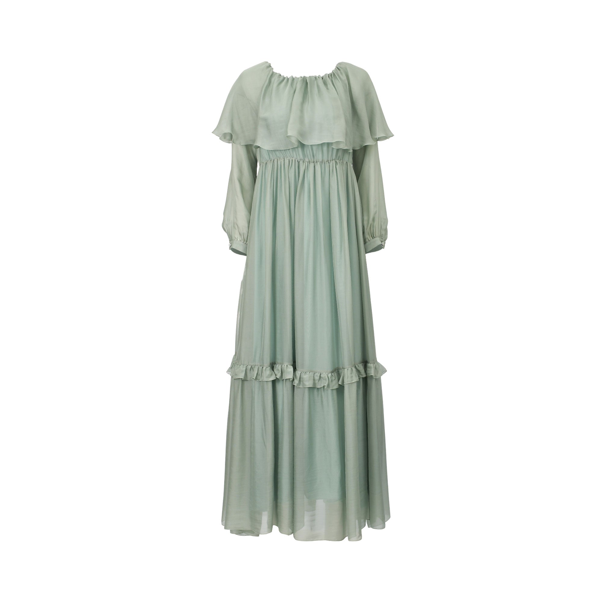 Sage green Raquel Diniz maxi dress with gathered neckline, ruffle overlay, long sleeves, and tiered skirt.