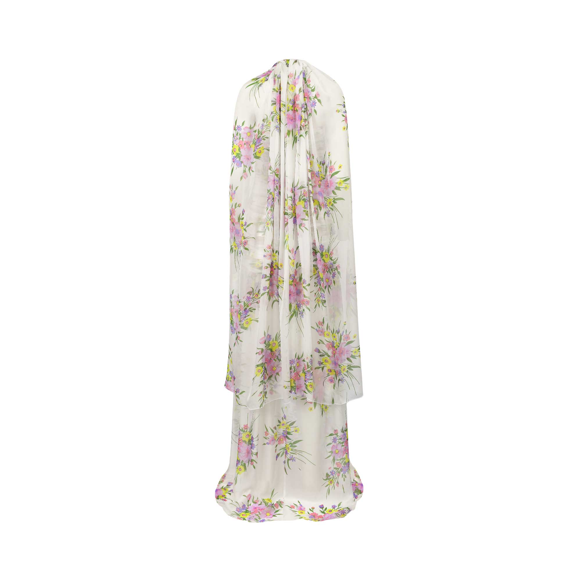 White sheer maxi dress with a flowing drape, featuring a vibrant floral pattern of pink, purple, and yellow flowers.