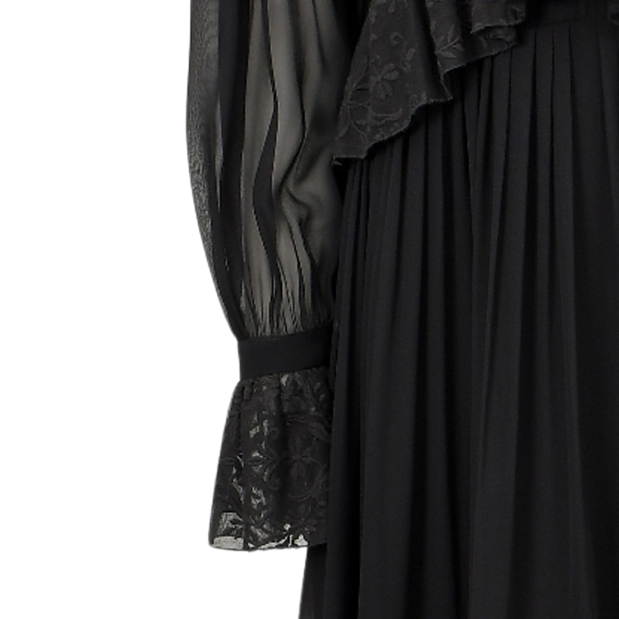Black dress with sheer long sleeves, wide lace cuffs, a pleated skirt, and a ruffled lace bodice detail.