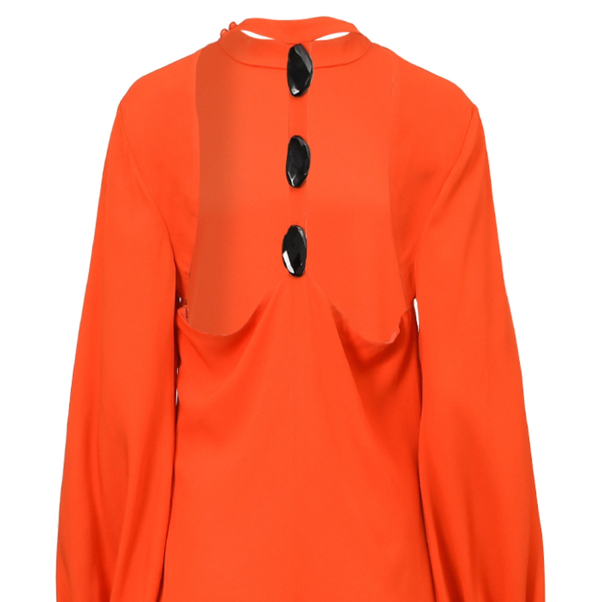 Orange long-sleeve dress with high collar, three large black oval buttons, and a scalloped front opening revealing a lighter