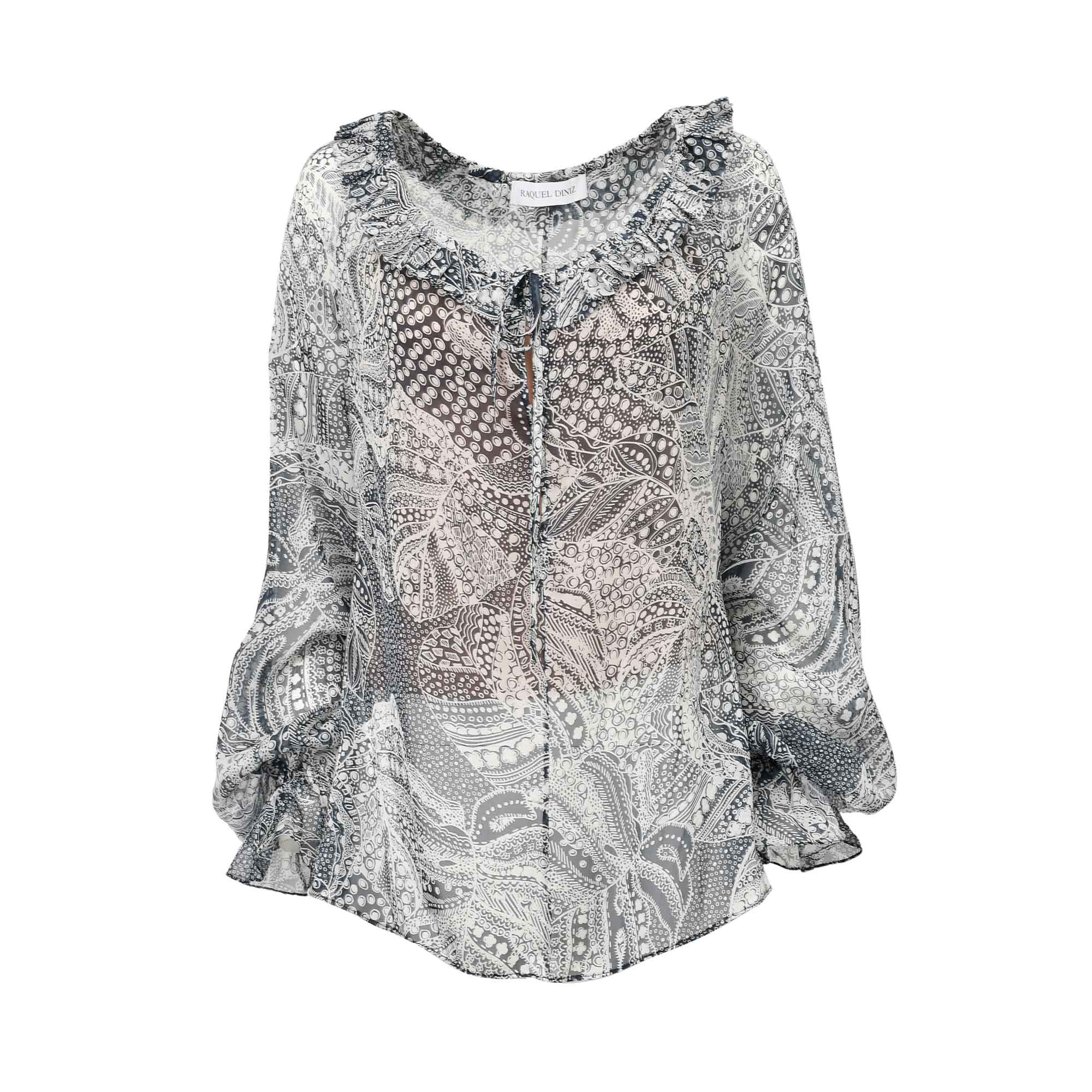 Raquel Diniz women's sheer top with a multi blue and white intricate pattern, ruffled V-neck, and tie-front.