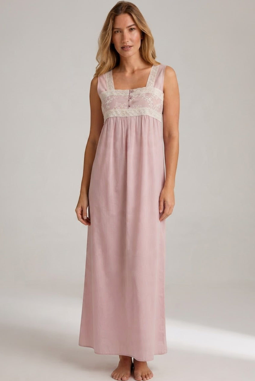 Muted pink sleeveless long dress with a square neckline, cream lace bodice with floral embroidery, and two small front button