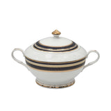RICHFINE luxury porcelain dinnerware set featuring navy blue and gold textured borders, including plates, bowls, tea pot, soup tureen, and serving platters on a white background.