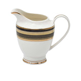 RICHFINE luxury porcelain dinnerware set featuring navy blue and gold textured borders, including plates, bowls, tea pot, soup tureen, and serving platters on a white background.