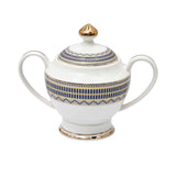 RICHFINE 98-piece white porcelain dinnerware set featuring navy blue geometric patterns, gold finials, and a full tea service against a white background.