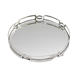 High-angle shot of a circular Royal Family mirrored vanity tray, showcasing the high-shine silver plating and sturdy ball feet.