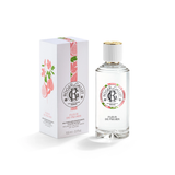 A 100ml clear glass bottle of Roger & Gallet Fleur de Figuier Wellbeing Fragrant Water with a white and gold cap next to its white illustrated product box.