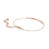 A detailed rear perspective studio shot of the Swarovski Only bracelet, highlighting the smooth, high-shine 18K rose gold-finished backing of the bar, the fluid link chain, and the lobster clasp enclosure.