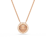 A detailed product shot of the reverse side of the Swarovski Sublima pendant, displaying the intricate, open-work geometric gold framework and the polished 18K rose gold-plated backing with a central swan logo stamp.