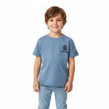 Young boy modeling the Roberto Cavalli blue logo t-shirt paired with denim jeans against a plain white background.