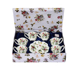 The Royal Family tea set inside its matching floral-patterned presentation box with the lid open, showcasing the luxury packaging.