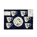 A 12-piece Royal Family "Royal Collection" tea set in fine bone porcelain, featuring floral cups and saucers arranged in a blue satin-lined gift box.