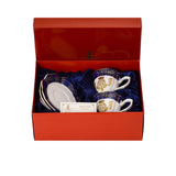 Top-down view of the Royal Family "Precious Collection" tea set in its gift box with an authenticity card detailing its limited edition status.