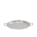 A 45-degree angle view of a polished silver oval serving tray highlighting the reflective surface and beaded rim detail.