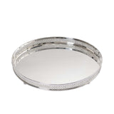 Elevated perspective of an oval mirrored tray by Royal Family, highlighting the silver diamond-pattern railing and reflective surface.