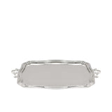 A three-quarter view of a polished silver rectangular serving tray with a scalloped rim and decorative handles.