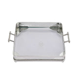 Close-up of the silver tray showing the high-polish finish, the pierced gallery design, and the decorative texture on the handles.