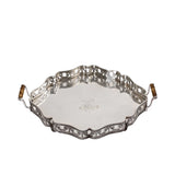 Top-down perspective of the Royal Family silver tray highlighting the polished mirror surface, central engraved monogram, and bamboo-style handles.