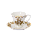 A single Royal Family porcelain coffee cup and scalloped saucer featuring intricate gold filigree and a royal crowned crest on a white background.