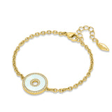 Gold-toned chain bracelet with a round white mother-of-pearl inlay pendant framed by clear crystals. The pendant has a crysta